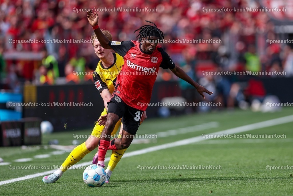 B0411052501024 | 11.05.2025, Fußball, Bayer 04 Leverkusen - Borussia Dortmund, 1. Fußball Bundesliga, 33. Spieltag, BayArena, Saison 2024 2025: Jeremie Frimpong (Bayer04 Leverkusen #30) im Zweikampf gegen Julian Brandt (BVB #10) DFB regulations prohibit any use of photographs as image sequences and or quasi-video.