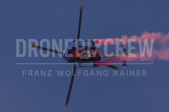 Audi FIS Ski World Cup: Men’s Slalom – Hahnenkamm Race, Kitzbuehel | Kitzbuehel, Austria, 25.Jan.26 - Alpine Skiing - FIS World Cup, Hahnenkamm Race, Slalom, men. The image shows red bull helicopter air show.