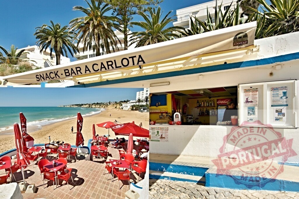 Snack bar A Carlota Algarve beach summer view | Snack bar A Carlota offering drinks and food with an ocean view on a sunny day - Realisiert mit Pictrs.com