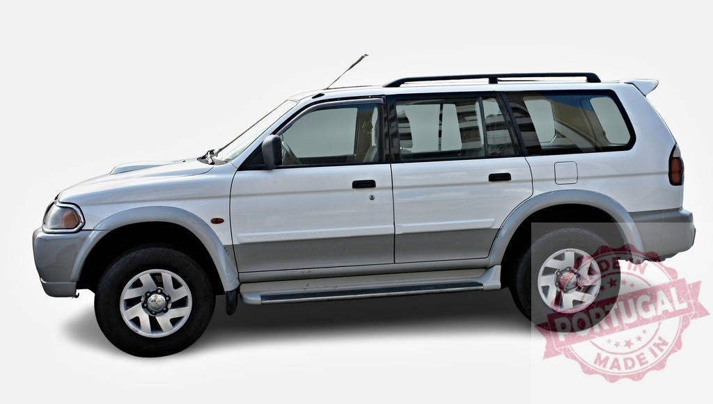 White Mitsubishi Montero Sport posing on white background | Profile of a white Mitsubishi Montero Sport SUV parking on a white background - Realized with Pictrs.com