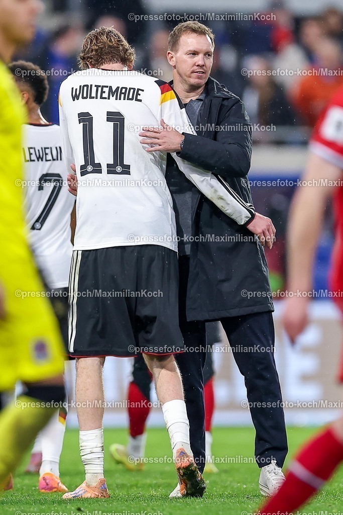 DFB14112501167 | 14.11.2025, Fußball, Länderspiel, WM-Qualifikation Europa, Deutschland - Luxemburg, Stade de Luxembourg (Croix de Gasperich, Luxemburg), 9. Spieltag, Saison 2025 2026: Nationaltrainer Julian Nagelsmann (GER #hc) zusammen mit Nick Woltemade (GER #11) Umarmung  Regulations prohibit any use of photographs as image sequences and or quasi-video.