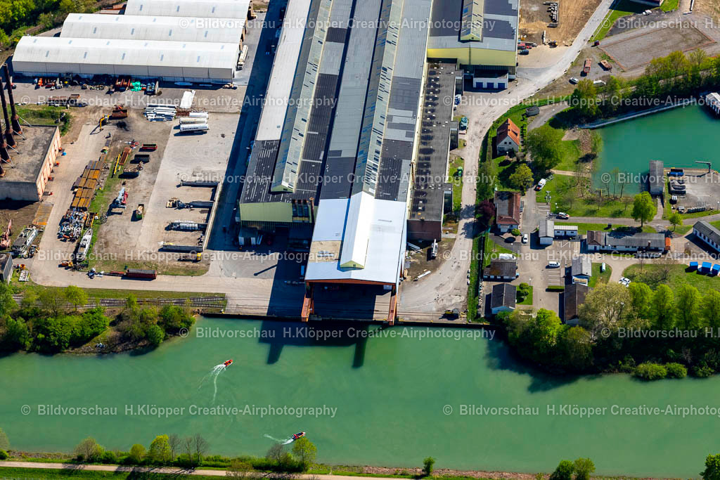 Luftbilder Voerde-0695 | Luftbild Lagerhauskomplex- Gebäude im Gewerbegebiet WDK Hafen und Lager GmbH am Wesel-Datteln-Kanal im Ortsteil Spellen in Voerde (Niederrhein) im Bundesland Nordrhein-Westfalen - Realisiert mit Pictrs.com