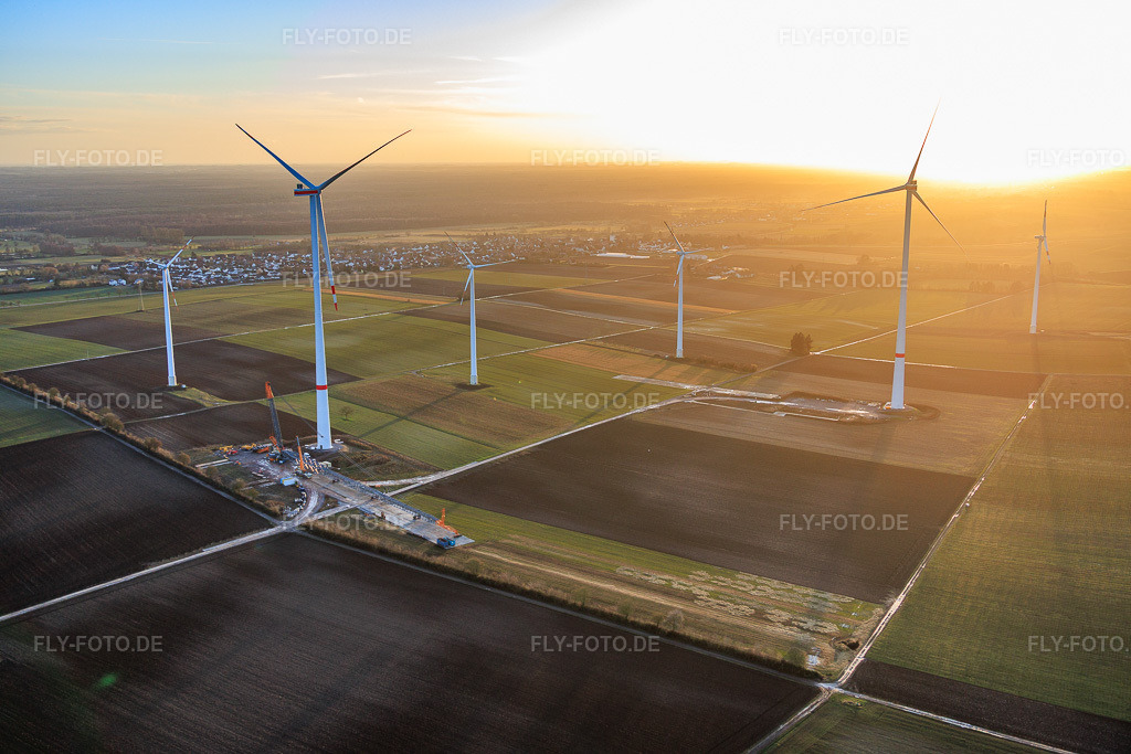 Luftbild: Repowering des Windpark Minfeld. JUWI ersetzt vier Altanlagen (GE 1.5) aus 2004 durch zwei neue, modernen Anlagen vom Typ Vestas V162 mit je sechs MW in Kandel im Bundesland Rheinland-Pfalz in Deutschland. Foto: IMG_152992.jpg vom 07.02.2026 durch Werner Riehm/FLY-FOTO.deJUWI Windparks - JUWI