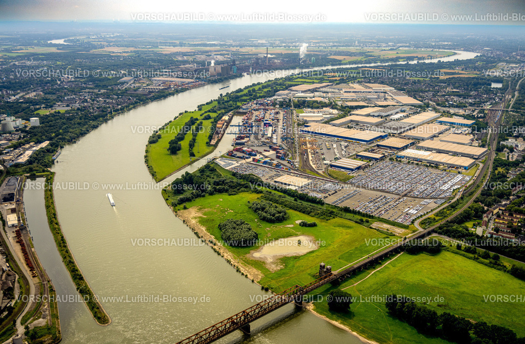Duisburg240711018Logport I | Luftbild, Duisburg-West, logport I (Eins) Rheinhausen, duisport mit D3T Duisburg Trimodal Terminal, DIT Duisburg Intermodal Terminal und Automobil-Logistik am Fluss Rhein, vorne die Hochfelder Eisenbahnbrücke, hinten links der logport II (Zwei) und HKM Hüttenwerke Krupp Mannesmann am Fluss Rhein, Fernsicht, Friemerheim, Hochfeld, Duisburg, Ruhrgebiet, Nordrhein-Westfalen, Deutschland