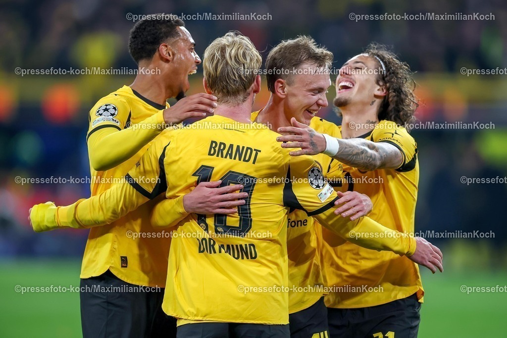 UCL01102501126 | 01.10.2025, Fußball, UEFA Champions League, Borussia Dortmund - Athletic Club Bilbao, BVB Stadion, 2. Spieltag, Saison 2025 2026: Torjubel nach dem Tor zum 4:1 durch Torschütze Julian Brandt (BVB #10)  zusammen mit  Felix Nmecha (BVB #08) Maximilian Beier (BVB #14) Fabio Silva (BVB #21) Regulations prohibit any use of photographs as image sequences and or quasi-video.