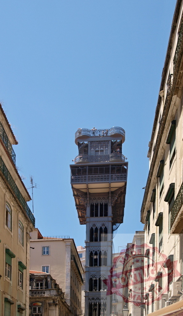 Santa Justa Lift iron elevator historic landmark in Lisbon. Lisbon - Portugal | Santa Justa Lift connecting streets, providing city views in Lisbon, Portugal - Realisiert mit Pictrs.com