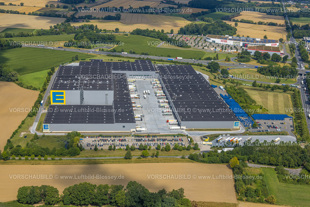 Hamm250701919Rhynern | Luftbild, Edeka Zentrallager, hinten Möbel Höffner Einrichtungshaus und Parkplatz, getrennt von der Autobahn A2 und Anschlussstelle Hamm, Stadtbezirk Rhynern, Hamm, Ruhrgebiet, Nordrhein-Westfalen, Deutschland
