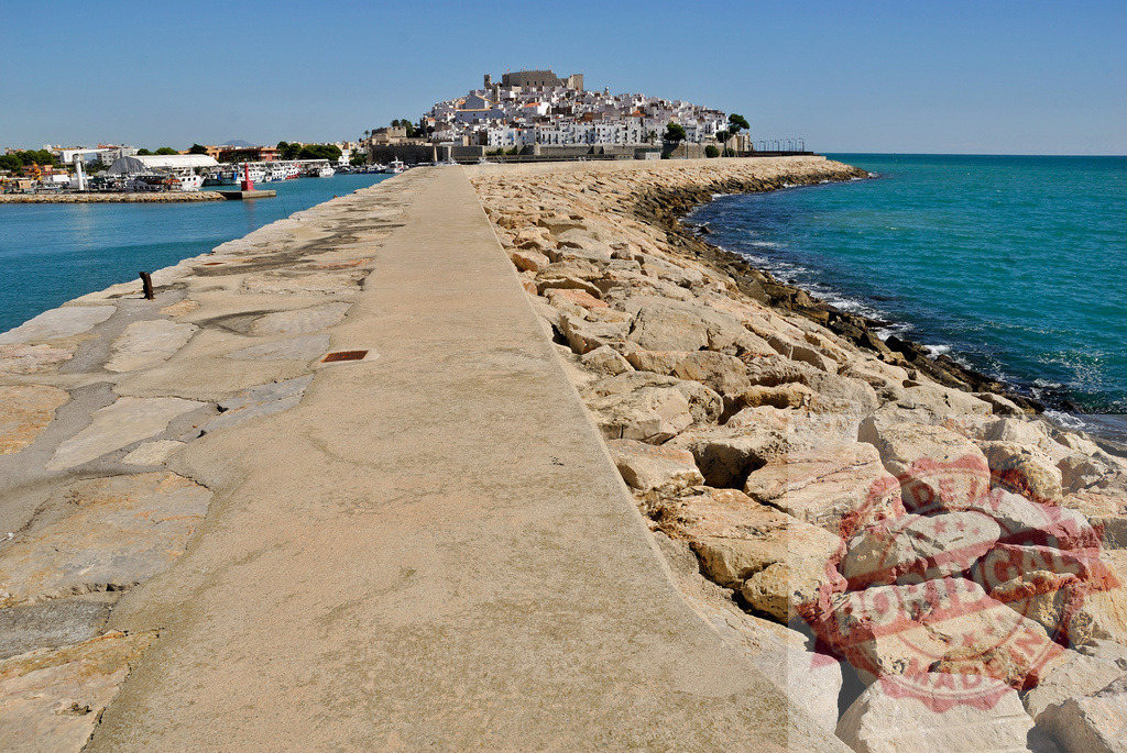Peñíscola old town and Castillo de Papa Luna from breakwater. Spain - Castellon | Peñíscola old town and historic castle showing its position on Mediterranean Sea - Realized with Pictrs.com