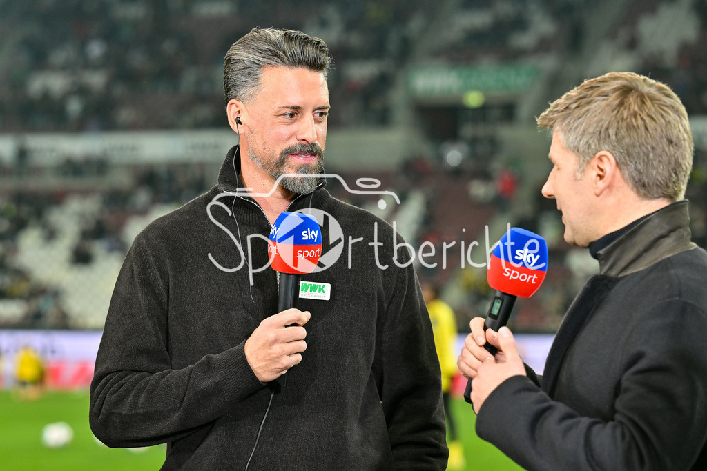 FC Augsburg - Borussia Dortmund | AUGSBURG, GERMANY - OCTOBER 31: Sandro WAGNER headcoach FC Augsburg, interview, sky, happy, before the bundesliga match between FC Augsburg vs. Borussia Dortmund on matchday 9 at WWK Arena on October 31, 2025 in Augsburg, Germany / DFL REGULATIONS PROHIBIT ANY USE OF PHOTOGRAPHS AS IMAGE SEQUENCES AND/OR QUASI-VIDEO