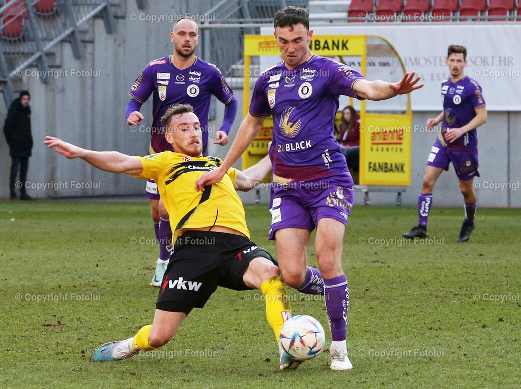 A_LUI_05032023_09 | SPORT,FUSSBALL,ADMIRAL BUNDESLIGA AUSTRIA KLAGENFURT-SCR ALTACH 05.03.2023IM BILD: ANDREW IRVING (KLAGENFURT) UND STEVEN BAEHRE  (ALTACH) BILD:FOTOLUI/MW