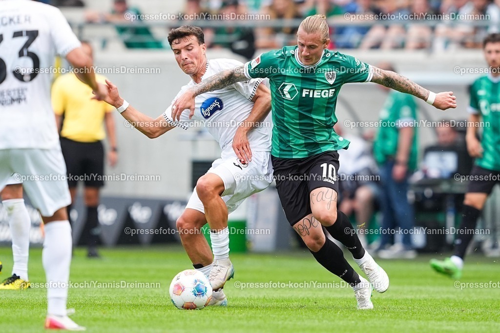 xYDR26072501018 | 26.07.2025, xydrx, Fußball, SC Preußen Münster - Viktoria Köln, Testspiel, LVM-Preußenstadion: Leonhard Muenst (Viktoria Köln #5) im Zweikampf gegen Marvin Schulz (SC Preußen Münster #10)
