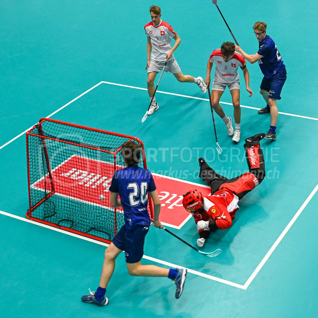 Switzerland U19 vs Finland U19 - 3. February 2024 | Switzerland U19 vs Finland U19
U19 Men International Matches in Switzerland
GoEasy Arena, Siggenthal Station
Finland defender #20 Ilmo Leino scoring against Switzerland goalie #30 Ilja Brunner.
Credit: Markus Aeschimann | <a href="https://www.markus-aeschimann.ch">Sportfotografie Markus Aeschimann</a> | <a href="https://www.instagram.com/sportfotografie.aeschimann">@sportfotografie.aeschimann</a> - Realisiert mit Pictrs.com