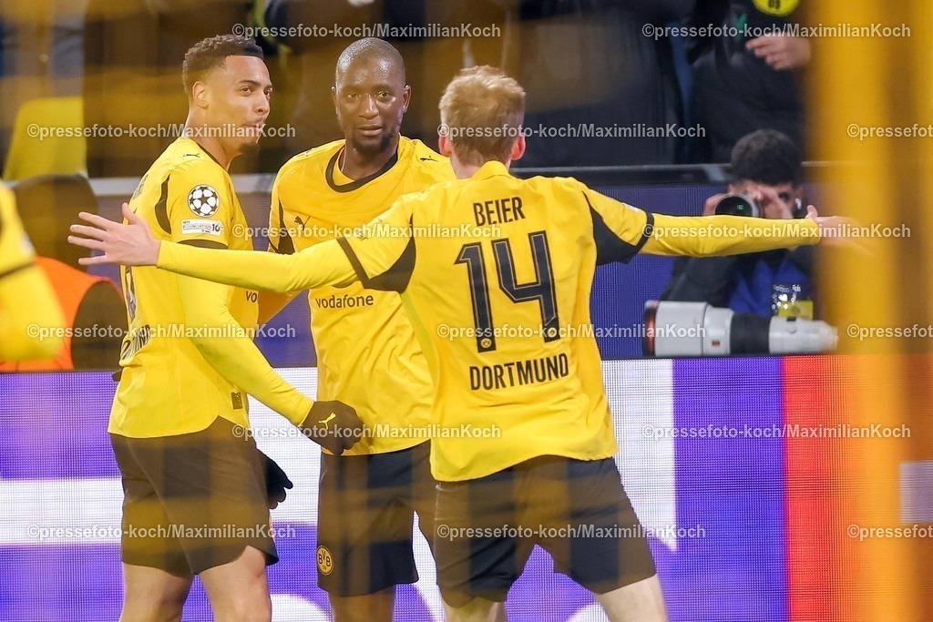 UCL17022601052 | 17.02.2026, Fußball, UEFA Champions League, Borussia Dortmund - Atalanta Bergamo, BVB Stadion, Play-Offs Hinspiel, Saison 2025 2026: Torjubel nach dem Tor zum 2:0 durch Torschütze Maximilian Beier&nbsp;(BVB #14)  zusammen mit  Serhou Guirassy&nbsp;(BVB #09) Felix Nmecha&nbsp;(BVB #08)    Regulations prohibit any use of photographs as image sequences and or quasi-video.