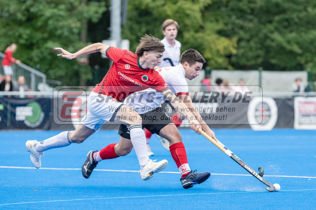 HK_20230923_104458 | 1. Bundesliga Herren Crefelder HTC - TSV Mannheim am 23.9.2023 CHTC, Krefeld , Acosta Nicolas ( Crefelder HTC #25 ) , Marius Haber ( TSV Mannheim #25 )