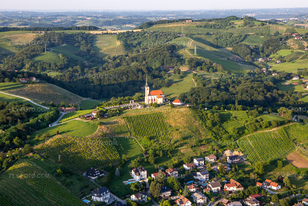 Aerial view: Gorca Church - Marijina cerkev v Malečniku in the district Malečnik in Maribor in the state Slovenia, Slovenia. – Photo: IMG_137395.jpg taken on 07/08/2023 by Werner Riehm/FLY-FOTO.com – Resolution of the original: 5472 x 3648 px