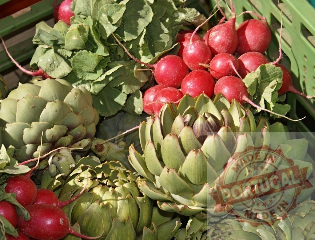 Fresh artichokes and radishes at market | Fresh artichokes and radishes bundled for sale at a local farmers market - Realized with Pictrs.com
