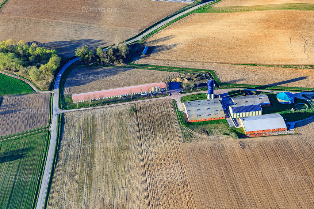 Aerial view: Relocated farm with biogas plant in Trimbach in the state Bas-Rhin, France. – Photo: IMG_097833.jpg taken on 03/27/2017 by Werner Riehm/FLY-FOTO.com – Resolution of the original: 5472 x 3648 px