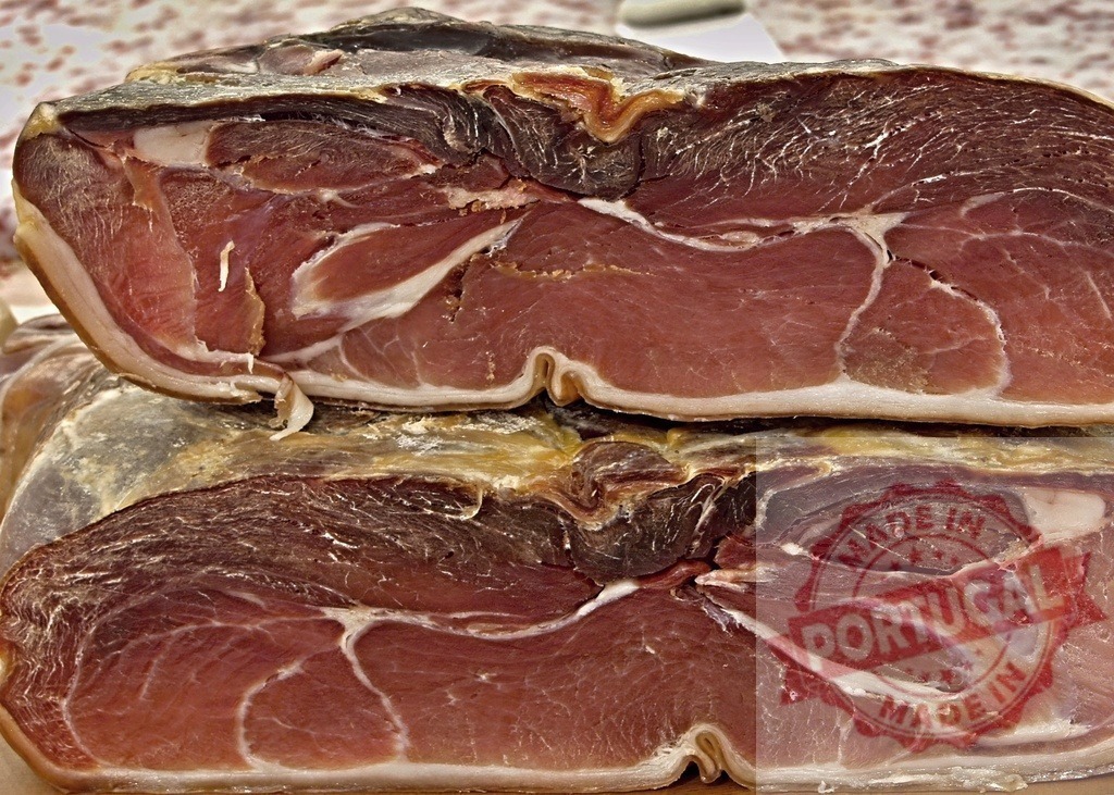 Dry-cured ham showing texture and rich color | Dry-cured ham revealing its beautiful marbling and texture - Realized with Pictrs.com