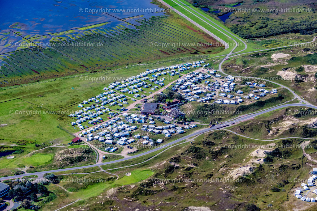 Norderney_Campingplatz_Um_Ost_ELS_6428050923 | NORDERNEY 05.09.2023 Campingplatz mit Wohnwagen und Zelten im Küstenbereich " Um Ost " in Norderney im Bundesland Niedersachsen, Deutschland. // Campsite with caravans and tents in the coastal area " Um Ost " in Norderney in the state Lower Saxony, Germany. Foto: Martin Elsen