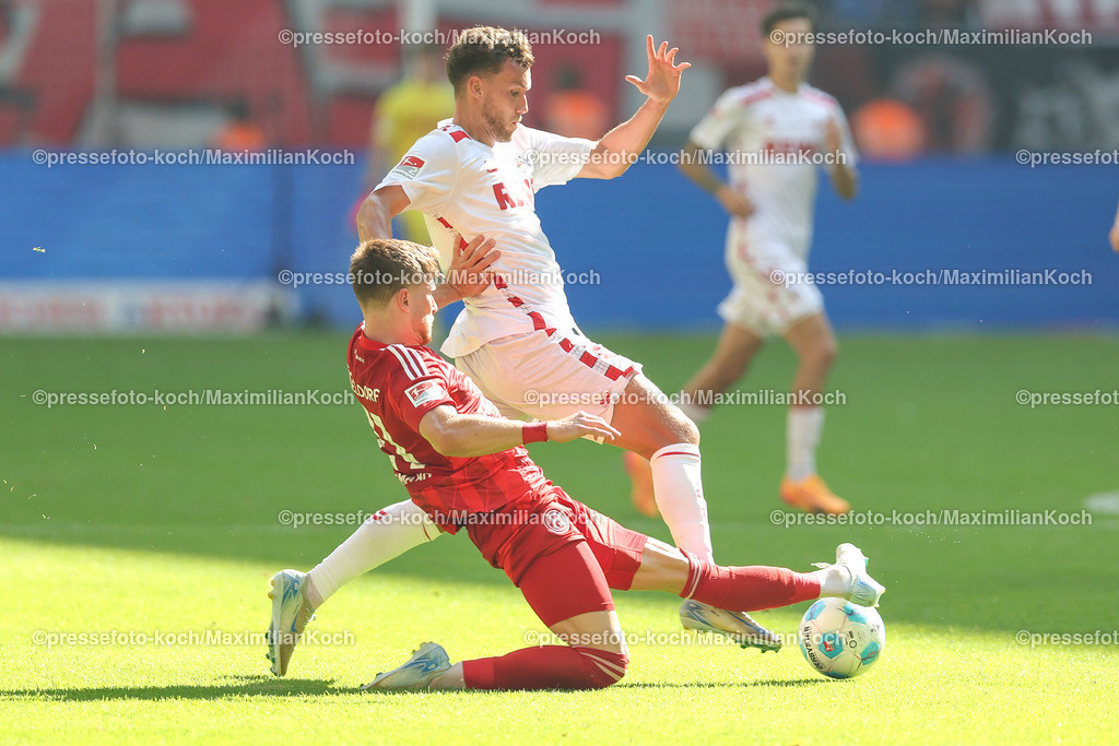 Due21092402132 | 21.09.2024, 2. Fußball Bundesliga, Fortuna Düsseldorf - 1. FC Köln, Merkur Spiel-Arena, Saison 2024 2025: Luca Waldschmidt (1.FC Köln #9) im Zweikampf mit Tim Rossmann (Fortuna Düsseldorf #21) DFB regulations prohibit any use of photographs as image sequences and or quasi-video.