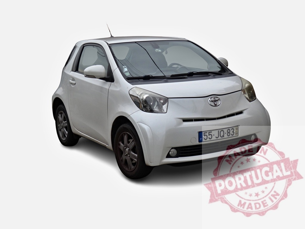 White Toyota IQ posing on a white background | Stylish, compact city car, a white Toyota IQ, is presented on a seamless white backdrop, ideal for automotive projects - Realisiert mit Pictrs.com