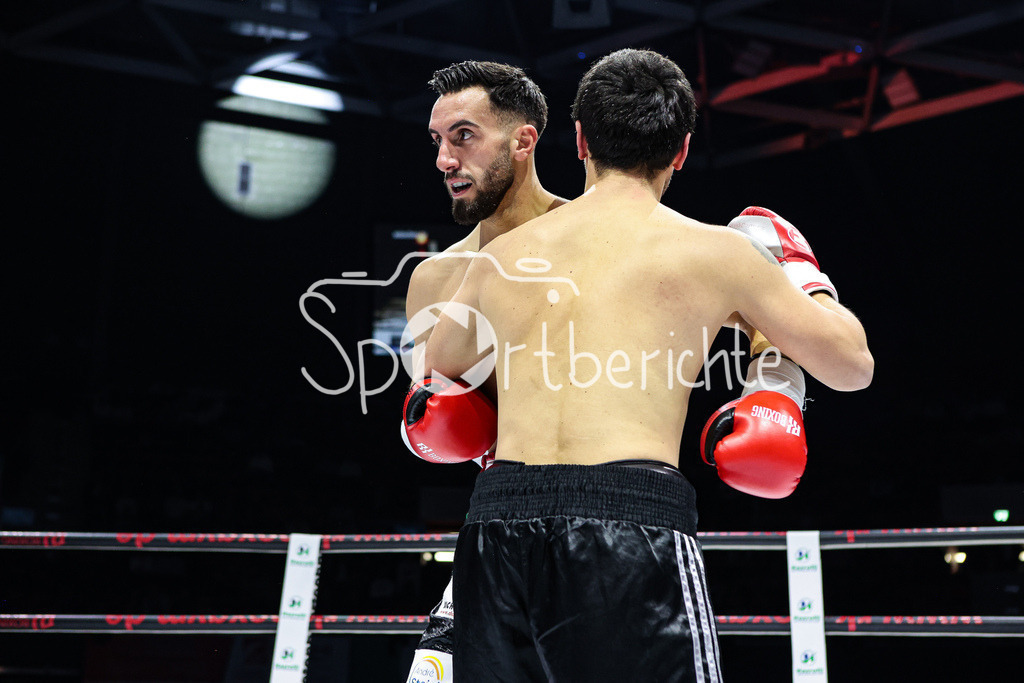 Profi - Box - Gala / Main Event | Kushtrim TAHIRUKAJ (rot schwarze Hose) in seinem Kampf gegen Nika GAVAJAVA (schwarze Hose)
