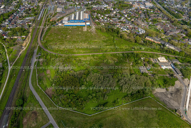 Oberhausen240401850 | Luftbild, Gutehoffnungshütte Radsatz Maschinenbauunternehmen, Biomasseheizkraftwerk der Energieversorgung Oberhausen AG, Bahnhof Sterkrade und Bahngleise, freie Wiesenfläche Ackerfeldstraße, Sterkrade Mitte, Oberhausen, Ruhrgebiet, Nordrhein-Westfalen, Deutschland