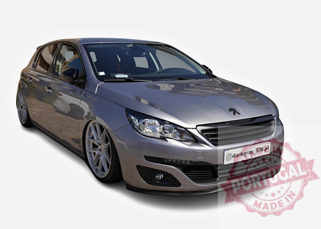 Peugeot 308 is parked, showing customized front bumper and alloy wheels | Modern customized Peugeot 308 is parked, showing its customized front bumper and alloy wheels - Realized with Pictrs.com