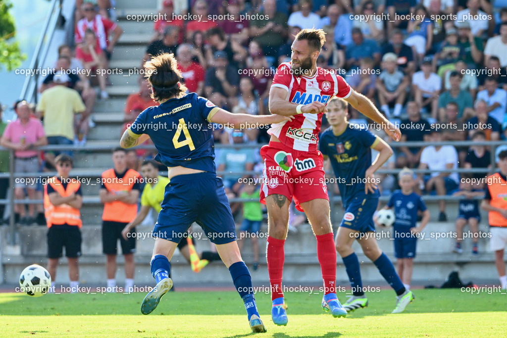 ATUS Velden vs. GAK | #4 Ryan Taylor Thomas Lee Colvin ATUS Velden, #9 Daniel Maderner GAK, ATUS Velden vs. GAK, ATUS Velden vs. GAK am 26.07.2024 in Villach (Stadion Lind), Austria, (Photo by Bernd Stefan)