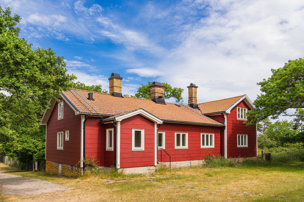 Rotes Holzhaus auf der Insel Öland in Schweden | Rotes Holzhaus auf der Insel Öland in Schweden.