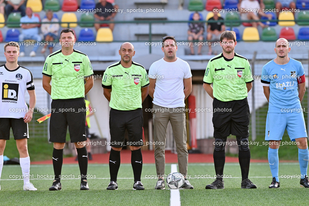 SV Spittal vs. SVG Bleiburg | #7 Ralph Roman Scheer SV Spittal, Nedim Hrvacic Referee, Edin Avdic Referee, Christopher Harder Referee, #6 Nikola Tolimir SVG Bleiburg, SV Spittal vs. SVG Bleiburg, SV Spittal vs. SVG Bleiburg am 14.08.2024 in Spittal an der Drau (Goldeck Stadion), Austria, (Photo by Bernd Stefan)