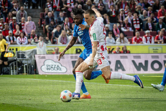 German Bundesliga,  1. FC Koeln - Bayer 04 Leverkusen, 25.04.2026 | KOELN, GERMANY - APRIL 25, 2026 :  Said El Mala  (1. FC Koeln, 13), Edmond Tapsoba (Bayer 04 Leverkusen, 12) during the German Bundesliga match on gameday 31 between 1. FC Koeln - Bayer 04 Leverkusen at RheinEnergieSTADION on April 25, 2026 in Koeln, Germany. DFL REGULATIONS PROHIBIT ANY USE OF PHOTOGRAPHS AS IMAGE SEQUENCES AND/OR QUASI-VIDEO.