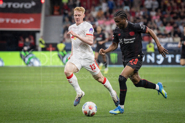 German Bundesliga, Bayer 04 Leverkusen vs. RB Leipzig, 02.05.2026 | LEVERKUSEN, GERMANY - MAY 2, 2026 :  Nicolas Seiwald (RB Leipzig, 13), Nathan Tella (Bayer 04 Leverkusen, 23) during the German Bundesliga match on gameday 32 between Bayer 04 Leverkusen vs. RB Leipzig at BayArena on May 2, 2026 in Leverkusen, Germany. DFL REGULATIONS PROHIBIT ANY USE OF PHOTOGRAPHS AS IMAGE SEQUENCES AND/OR QUASI-VIDEO.