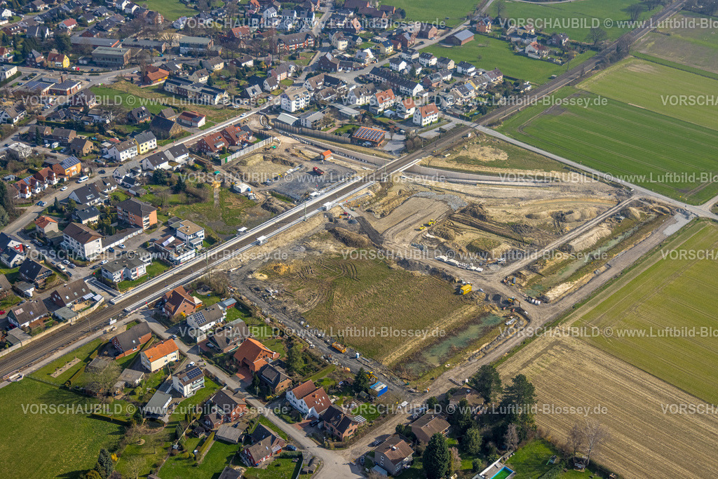 Hamm240306773 | Luftbild, geplante Nahverkehrsverbindung mit Haltepunkt in Westtünnen, Baustelle am Südfeldweg und Von-Thünen-Straße für den künftigen Bahnhaltepunkt, Wohnsiedlung, Stadtbezirk Rhynern, Hamm, Ruhrgebiet, Nordrhein-Westfalen, Deutschland