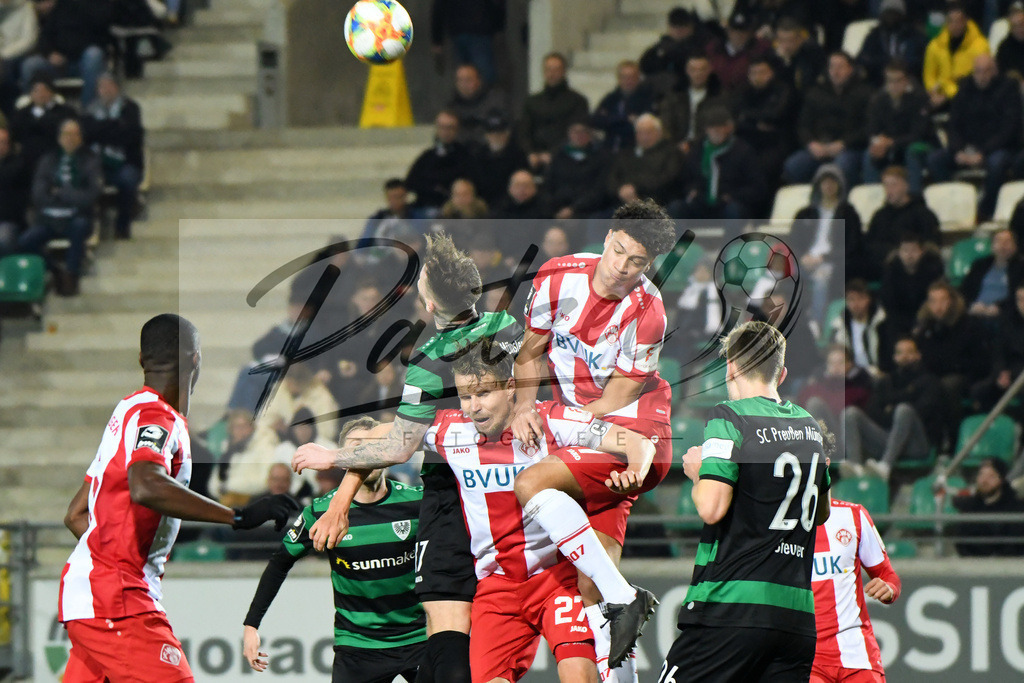 20200214_SCPFWK_0052 | Fussball, Herren: Jan Loehmannsroeben (SC Preussen Muenster) und Jonas David (FC Wuerzburger Kickers) im Zweikampf waehrend des Spiels der 3. Liga zwischen SC Preussen Muenster und FC Wuerzburger Kickers im Preussenstadion am 14.02.2020 in Muenster, Deutschland.DFB / DFL REGULATIONS PROHIBIT ANY USE OF PHOTOGRAPHS AS IMAGE SEQUENCES AND/OR QUASI-VIDEO. - Realisiert mit Pictrs.com