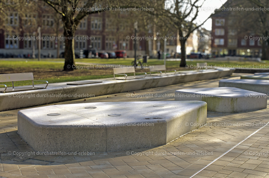 Fontänenbrunnen mit Parkbänken am Bremer Platz hinter dem Hauptbahnhof in Münster | Fontänenbrunnen mit Parkbänken am Bremer Platz hinter dem Hauptbahnhof in Münster - Realisiert mit Pictrs.com