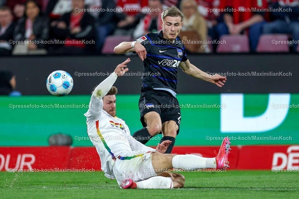 1FC05042501043 | 05.04.2025, Fußball, 1. FC Köln - Hertha BSC, 2.. Fußball Bundesliga, 28. Spieltag, RheinEnergie-STADION, Saison 2024 2025: Jan Thielmann (FC Koeln #29) im Zweikampf gegen Marten Winkler (Hertha BSC #22) DFB regulations prohibit any use of photographs as image sequences and or quasi-video.