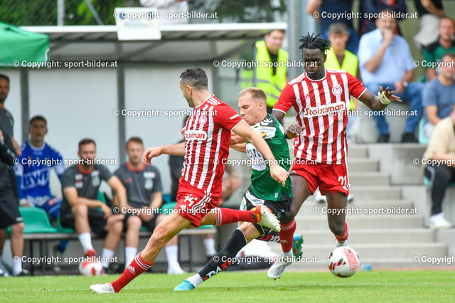 AUT, SV Ried (AUT) vs Olympiakos FC (GRE), Testspiel, Vorbereitung 2022-23 | 24.06.2022, Guntamatic  Arena Peuerbach, AUT, Testspiel Vorbereitung 2022-23, SV Ried (AUT) vs Olympiakos FC (GRE),  im Bild Christoph Monschein (Ried) vs Ousseynou Ba (Olympiacos FC), Kostas Manolas (Olympiacos FC)

// Test Match, New Season 2022-23 SV Ried (AUT) vs Olympiakos FC (GRE) in Peuerbach, Austria on 2022/06/24