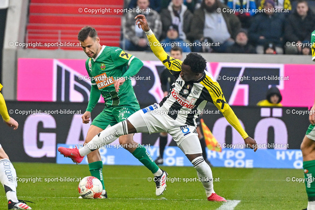 AUT, Admiral Bundesliga, LASK Linz vs SK Rapid Wien | 23.02.2025, Raiffeisen Arena Linz, AUT, Admiral Bundesliga, LASK Linz vs SK Rapid Wien, im Bild Louis Schaub of SK Rapid Wien, George Bello of Lask// Admiral Bundesliga Match between LASK Linz and SK Rapid Wien in Linz, Austria on 2025/02/23