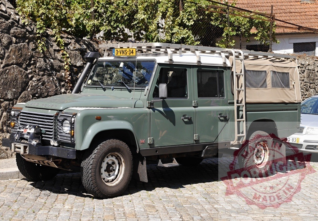 Land Rover Defender expedition rig parked on cobblestones | Rugged Land Rover Defender 4x4 overland vehicle prepared for adventure - Realisiert mit Pictrs.com