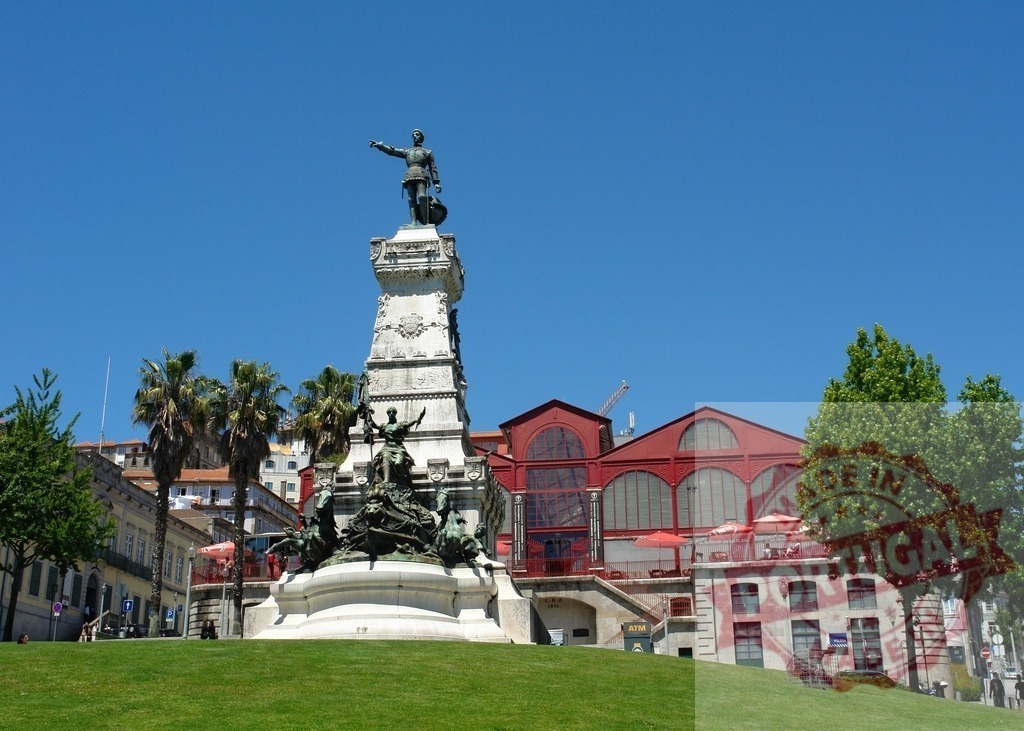 Prince Henry the Navigator Monument in Porto Portugal. Porto - Portugal | The statue of Prince Henry the Navigator standing tall in a city square on a sunny day - Realisiert mit Pictrs.com