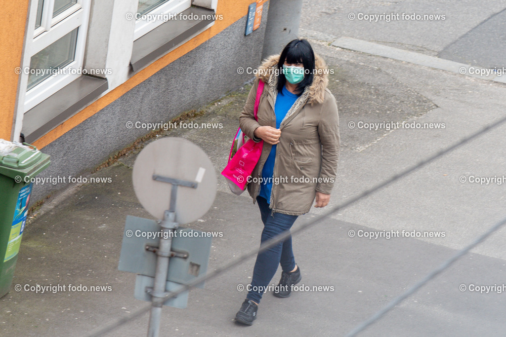 Corona_ 5 Jahre Covid Lockdown_ 15.03.2025-19 | 15.03.2025, Linz, AUT, Corona, 5 Jahre Covid Lockdown, im Bild Stadtansichten, Themenbild, Person mit Maske auf der Strasse, Lockdown, Virus, SARS, Schutz