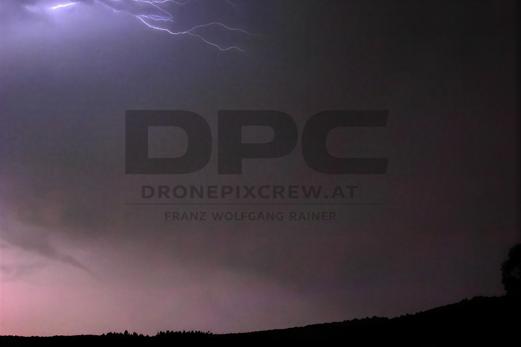 Lightning Storm over the Almenland | Multiple lightning strikes illuminate the night sky over the Almenland region in Austria during a powerful summer thunderstorm. - Realisiert mit Pictrs.com