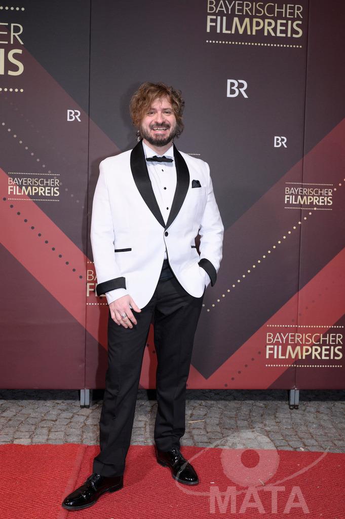 _DWI5043 | Daniel Christensen bei der Verleihung des 47. Bayerischen Filmpreises 2026  im Prinzregententheater. München, Deutschland. Der Bayerische Filmpreis wird seit 1979 von der Bayerischen Staatsregierung verliehen, um die Bedeutung des Kinofilms als Kulturgut herauszustellen - Realized with Pictrs.com