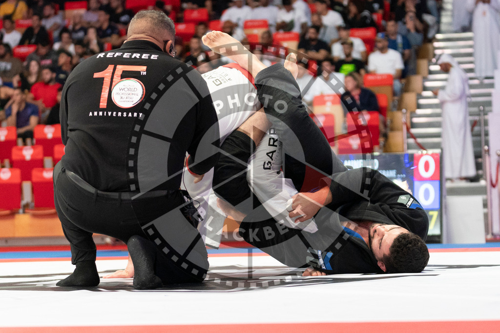 20231109PBB4481 | Fighters compete during the AJP World Professional Championship in the Mubadala Arena in Abu Dhabi, Arab United Emirates, on November 9, 2023.