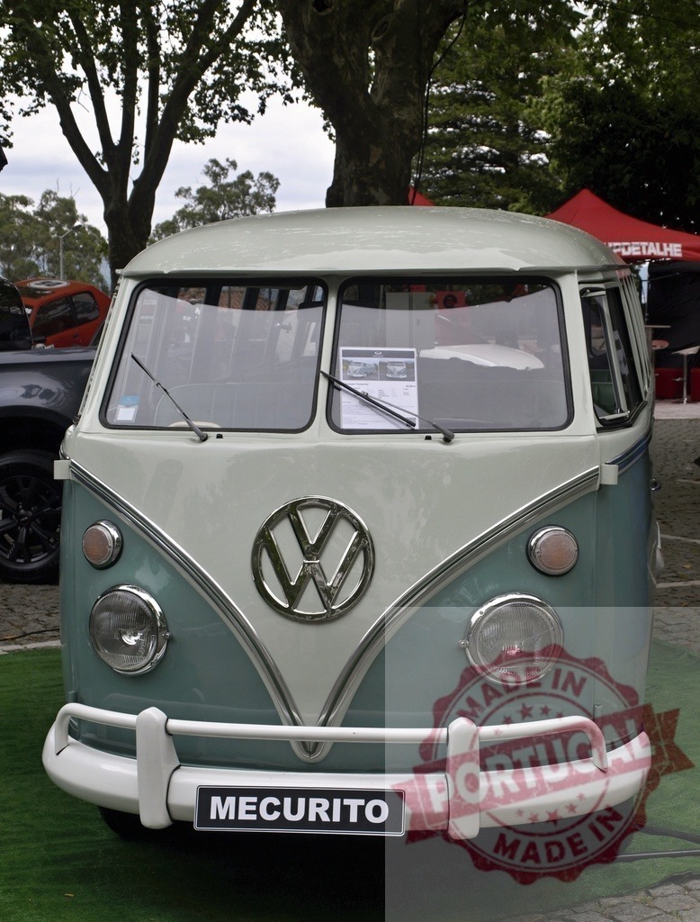 Front view of vintage two-tone Volkswagen Kombi van | Volkswagen Type 2 Transporter van at classic car show - Realized with Pictrs.com