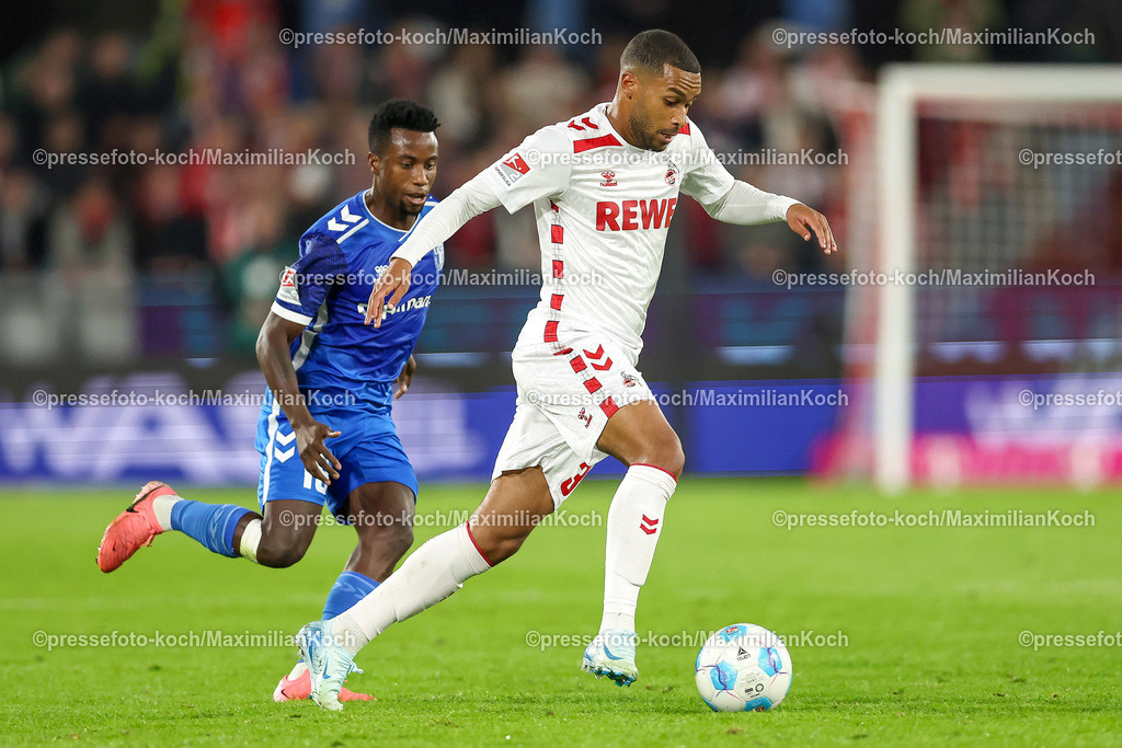 Koe14092401016 | 14.09.2024, 2. Fußball Bundesliga, 1. FC Köln - 1. FC Magdeburg, RheinEnergieSTADION, Saison 2024 2025: Linton Maina (1.FC Köln #37) gegen Emir Kuhinja (1.FC Magdeburg #18)DFB regulations prohibit any use of photographs as image sequences and or quasi-video.
