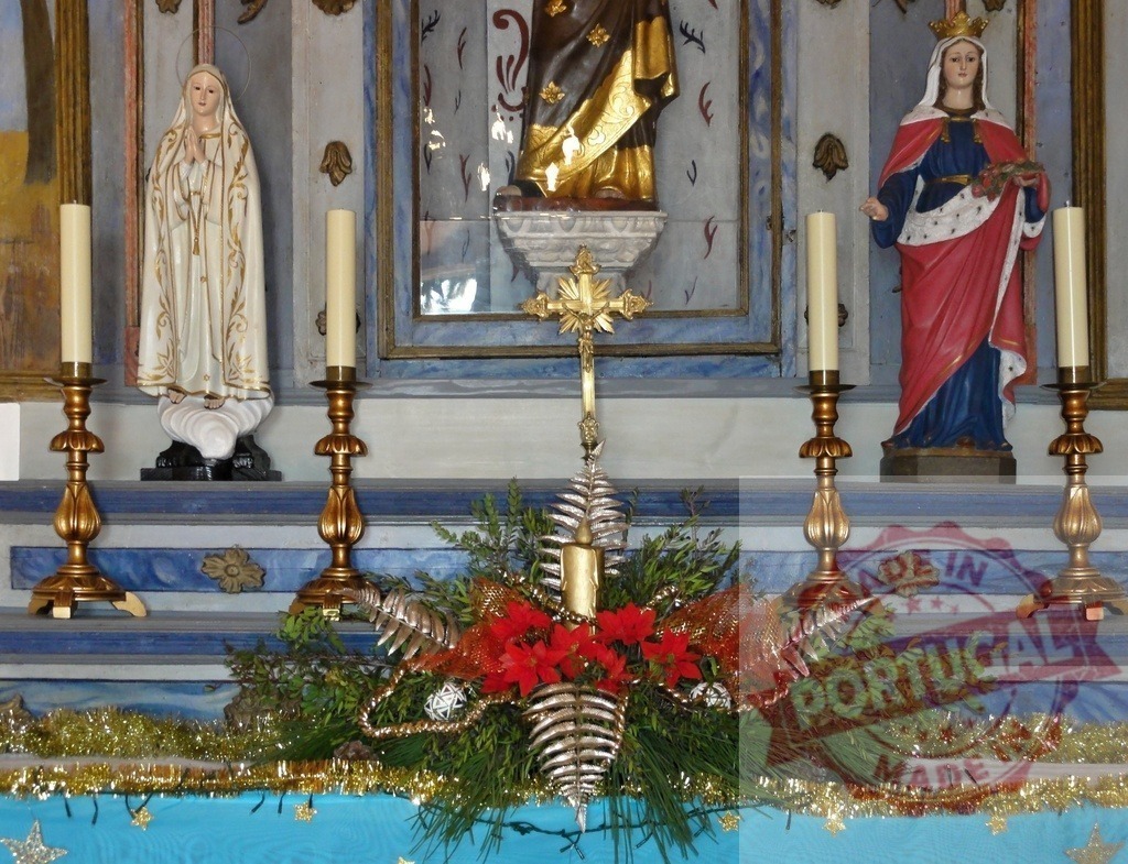 Christmas decorations illuminating altar with statues of virgin mary in portuguese church | Christmas decorations and candles illuminating altar with statues of Virgin Mary in Portuguese church - Realized with Pictrs.com