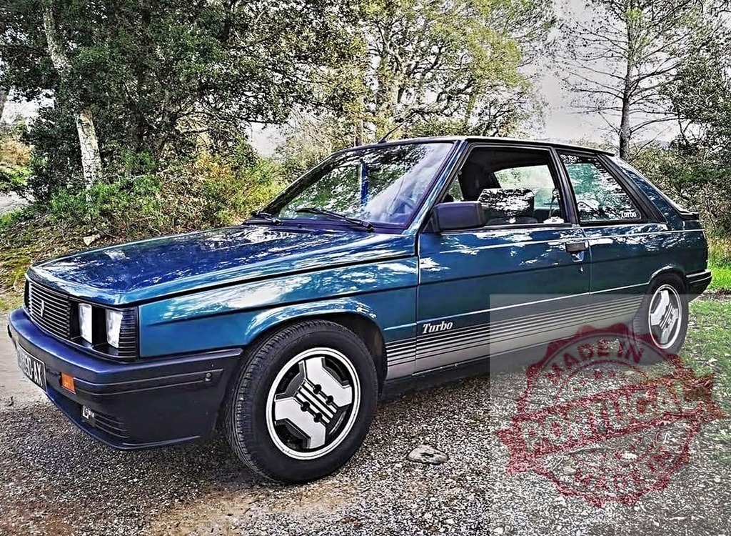 Renault 11 Turbo hatchback car vintage parking in nature | Renault 11 Turbo hatchback car parking on a gravel road in a natural setting - Realized with Pictrs.com