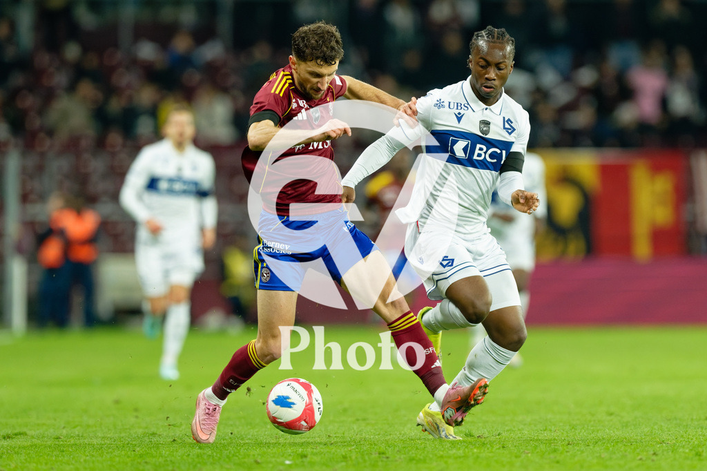 Brack Super League - Servette FC v FC Lausanne-Sport | Miroslav Stevanovic (9 Servette FC) in action (close up) under pressure of Brandon Soppy (2 FC Lausanne-Sport)  during the Brack Super League match between Servette FC and FC Lausanne-Sport at Stade de Geneve in Geneva, Switzerland